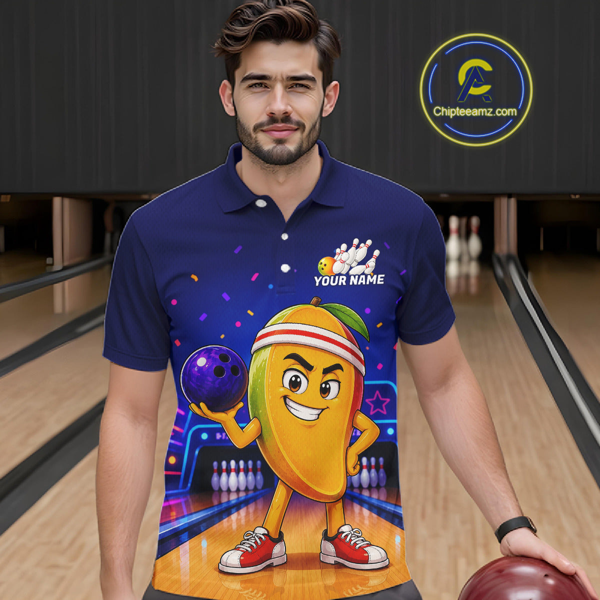 Man wearing a blue polo shirt with a colorful design of a character bowling in a bowling alley.