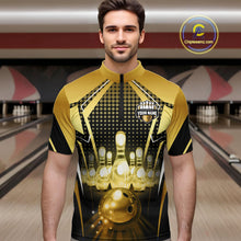 Load image into Gallery viewer, Male model wearing a custom black gold bowling quarter-zip shirt front view featuring a glowing bowling ball, illuminated bowling pins and gold geometric light beam pattern at the bowling alley