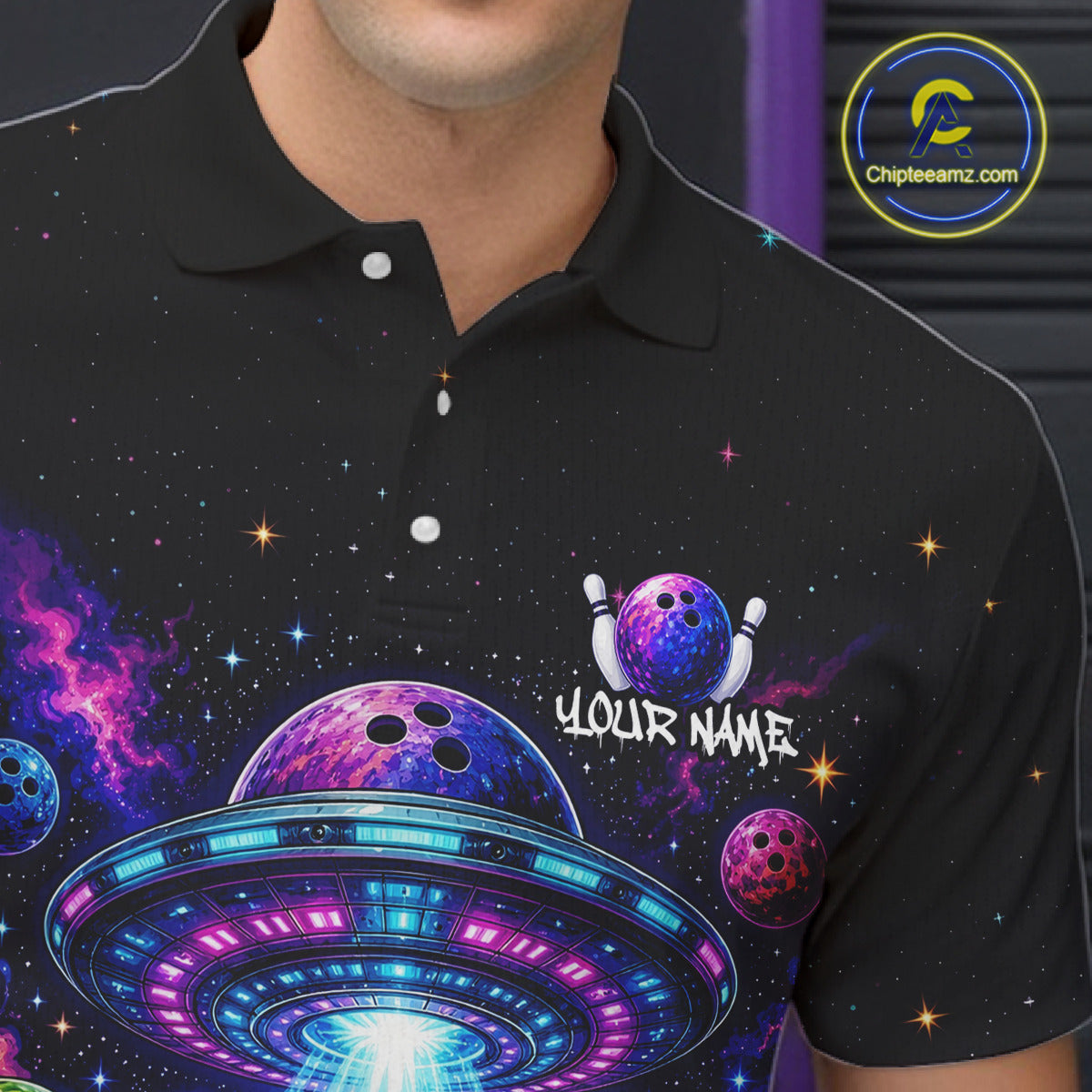 Black polo shirt with space-themed design featuring a UFO, planets, and bowling elements.