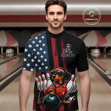 Load image into Gallery viewer, Man wearing a black polo shirt with a dachshund graphic and American flag design in a bowling alley.