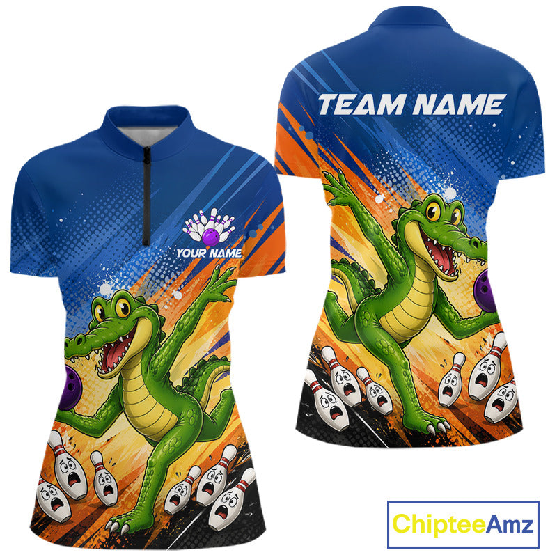 Front and back views of a short-sleeve quarter-zip polo shirt featuring a green cartoon alligator bowling design on a blue, orange, and black background. The front shows a black zipper, a white print logo with 'YOUR NAME', and the back shows 'TEAM NAME' in white.