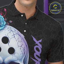 Load image into Gallery viewer, Person wearing a black polo shirt with a graphic design and customizable text.
