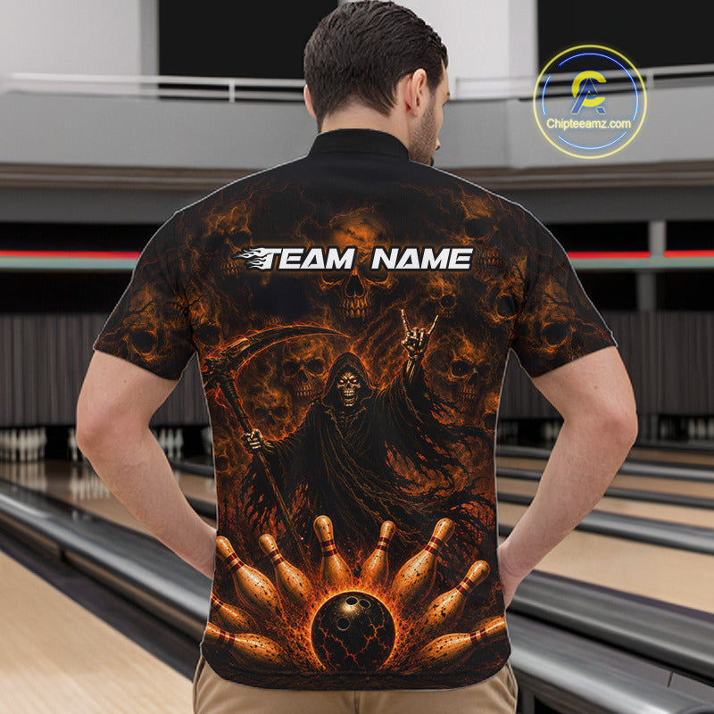 A man viewed from behind wearing a black short-sleeve bowling-themed polo shirt with a large fiery grim reaper graphic and the text 'TEAM NAME' across the upper back. Bowling lanes are visible in the background