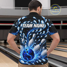 Load image into Gallery viewer, Person wearing a bowling-themed shirt with a blue ball and pins design in a bowling alley.