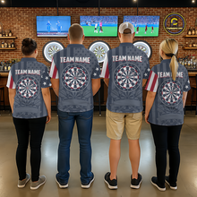 Load image into Gallery viewer, Darts team standing in front of electronic dartboards, showing the back of their matching uniform shirts with personalized team names and dartboard graphics.
