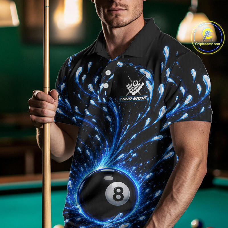 Man holding a pool cue wearing a black polo shirt with a blue and white design and '8' ball on a pool table.