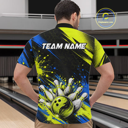 A man viewed from behind wearing a short-sleeve bowling-themed shirt with a bold graphic print of bowling pins, a bowling ball, and bright yellow, blue, and black abstract splashes. The shirt has 'TEAM NAME' printed across the upper back.