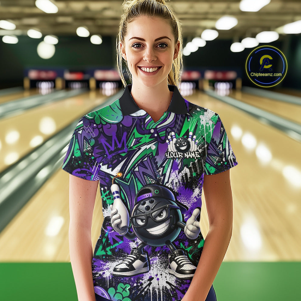 Woman wearing a colorful bowling shirt with a design in a bowling alley.