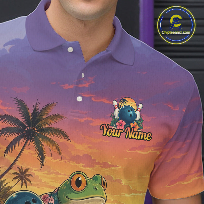 A close-up of a person wearing a short-sleeve polo shirt with a colorful tropical sunset print, palm tree, green turtle graphic, bowling pins and ball, and the text 'Your Name' on the chest. 