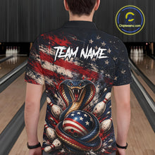Load image into Gallery viewer, Person wearing a shirt with a snake and American flag design in a bowling alley.