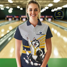 Load image into Gallery viewer, Person wearing a bowling-themed shirt with a dog graphic in a bowling alley.