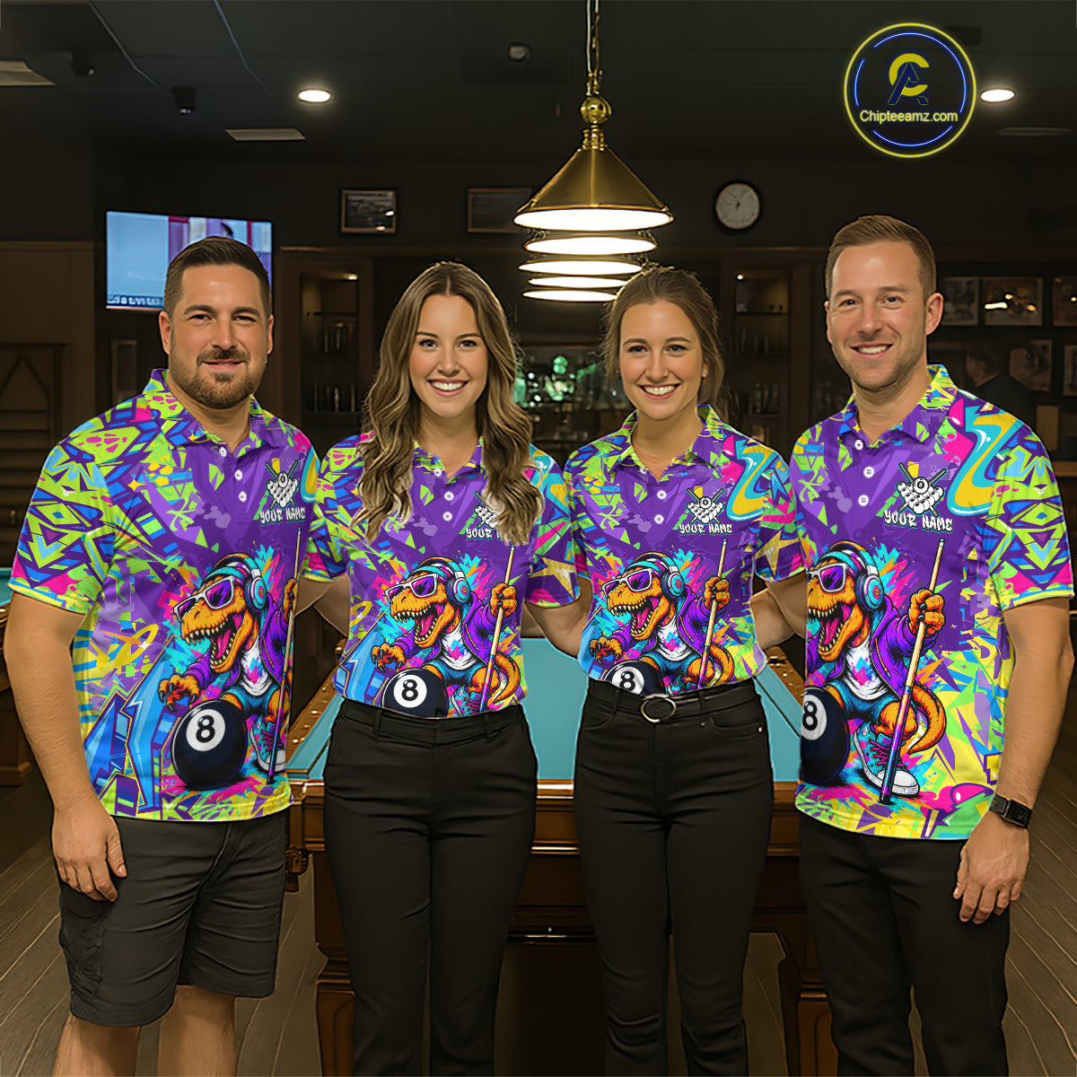 Four people wearing colorful shirts with a dinosaur and pool ball design in a bar setting.