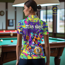 Load image into Gallery viewer, Person wearing graffiti shirt with a dinosaur design in a pool hall.