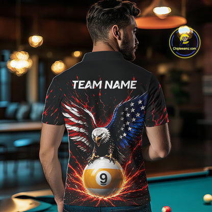 Man wearing a shirt with an eagle and pool ball design, standing in a bar.