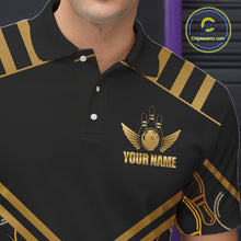 Load image into Gallery viewer, Close-up front view of a custom black gold bowling polo shirt showing the personalized player name, golden winged bowling ball emblem and geometric line design