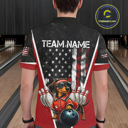 A person viewed from behind wearing a short-sleeve bowling-themed graphic shirt in a bowling alley. The shirt has a black and red design with an American flag motif