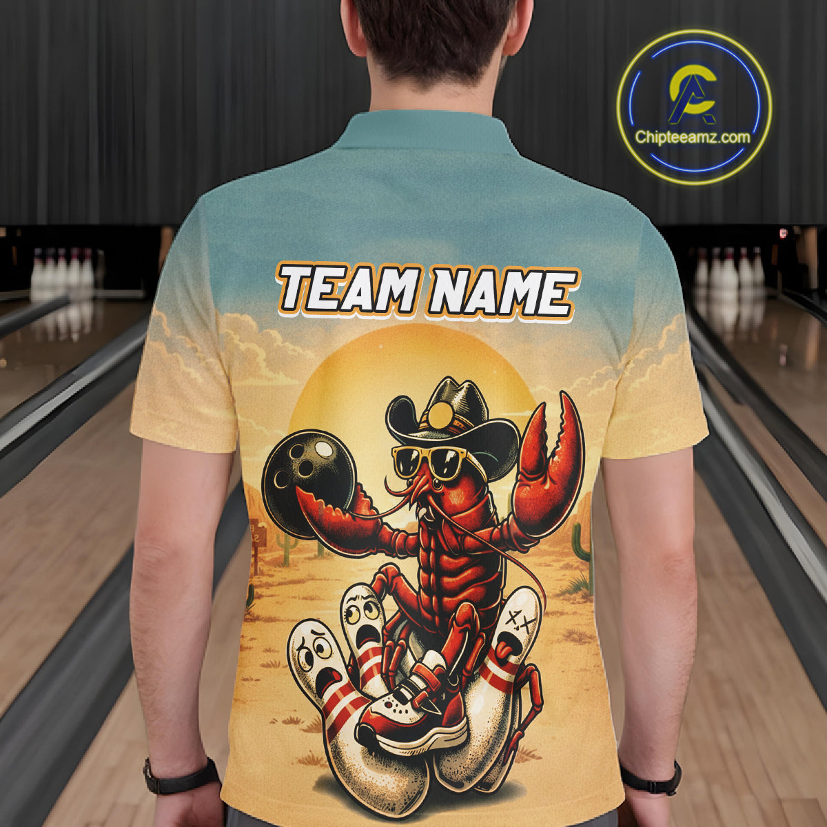 Person wearing a shirt with a crawfish bowling design and 'Team Name' text at a bowling alley.