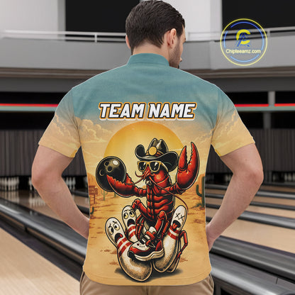 Man wearing a shirt with a colorful design of a crawfish in a cowboy hat and boots, standing in back of a bowling alley.