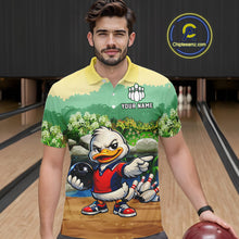 Load image into Gallery viewer, Man wearing a bowling-themed shirt with a cartoon character in a bowling alley.