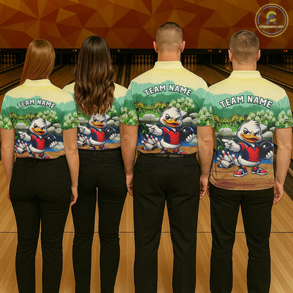 Four people wearing matching shirts with a cartoon character on a bowling alley.