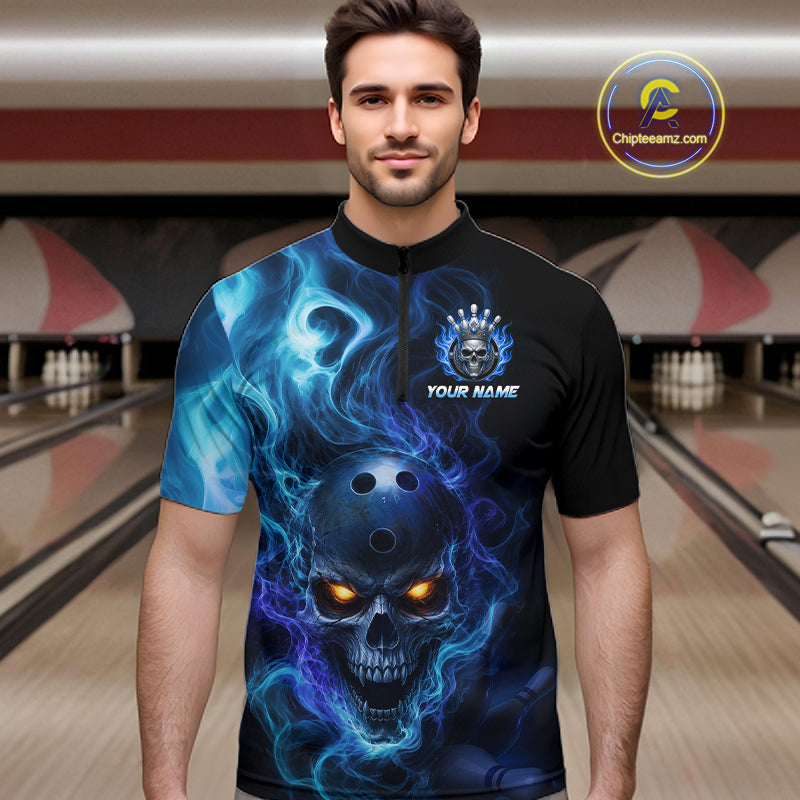 Man wearing a black bowling quarter zip shirt featuring a flaming skull with glowing orange eyes, blue smoke effects, and custom “YOUR NAME” text.