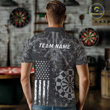 Load image into Gallery viewer, Man wearing darts polo shirt featuring dartboard graphics blended with a american flag pattern on a black gray background.