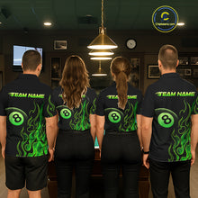 Load image into Gallery viewer, Four people wearing billiards polo shirt featuring an eight ball design surrounded by flowing green flame graphics on a black background.