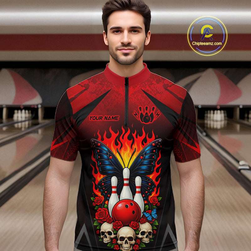 Man wearing a red and black bowling quarter zip shirt featuring flaming bowling pins, a red bowling ball, a blue butterfly, roses, skulls, and custom player name text.