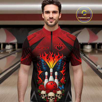 Man wearing a red and black bowling quarter zip shirt featuring flaming bowling pins, a red bowling ball, a blue butterfly, roses, skulls, and custom player name text.