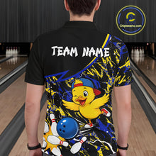 Load image into Gallery viewer, Person wearing a colorful bowling-themed shirt with a cartoon duck character in a bowling alley.