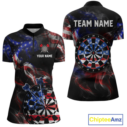 Front and back views of a black darts quarter zip featuring patriotic American flag smoke graphics, dartboards, blue darts, and custom team and player name text.