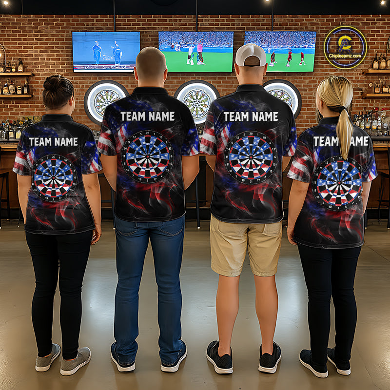 Four people wearing black darts polo featuring patriotic American flag smoke graphics, dartboards, blue darts, and custom team and player name text.