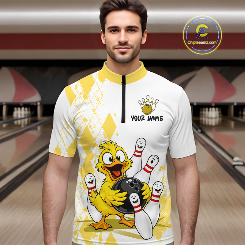 A man wearing a custom bowling-themed short-sleeve jersey with a cartoon chicken bowling pinsetter graphic, set against a blurred bowling alley background.