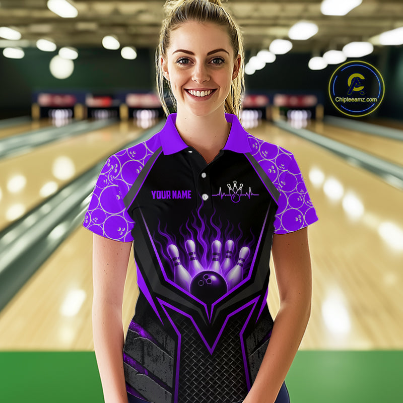 Woman wearing a custom bowling shirt with a purple design in a bowling alley.