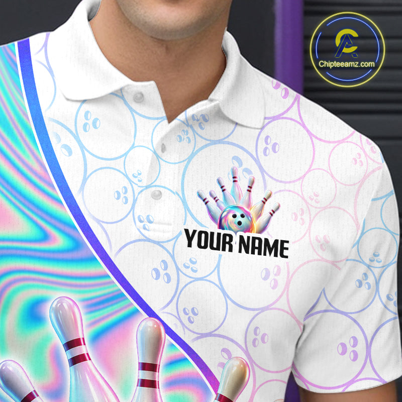 A close-up of a person wearing a white short-sleeve polo shirt with bowling-themed graphics, including a bowling hand, bowling pins, bowling balls, and the text 'YOUR NAME' on the chest. The shirt has a holographic rainbow diagonal stripe and a repeating bowling pattern.
