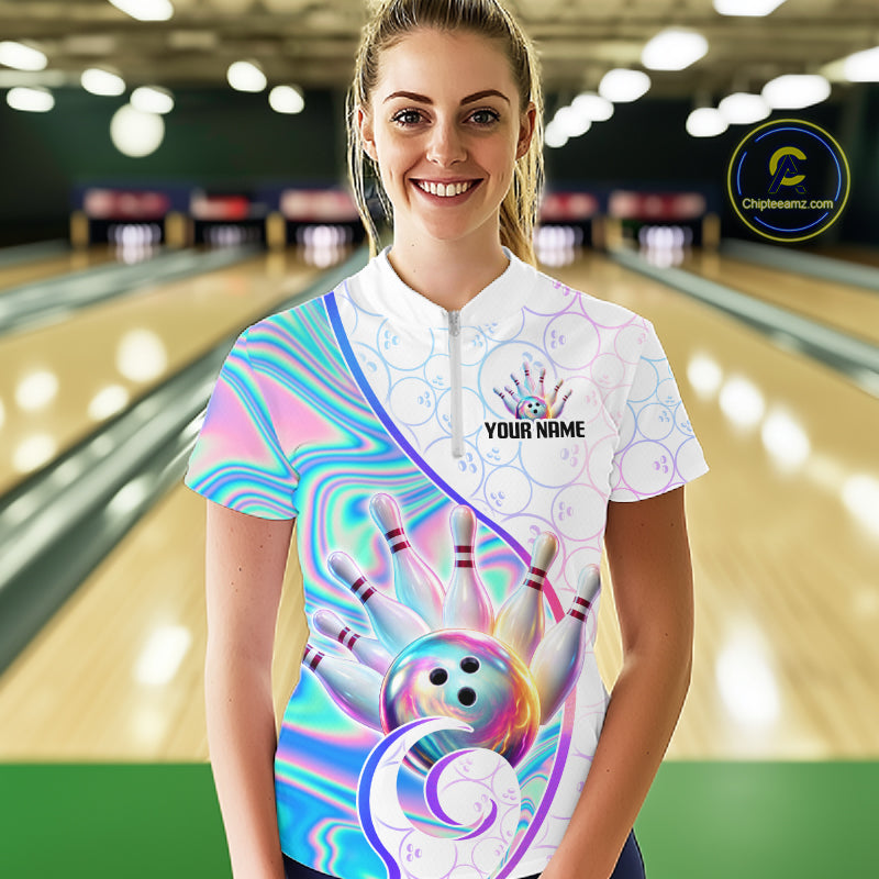 A woman wearing a custom bowling-themed short-sleeve polo shirt with a colorful psychedelic design of bowling pins and a bowling ball. The shirt features a white collar and a white zipper at the neck, with the text 'YOUR NAME' and a bowling pin graphic on the chest.