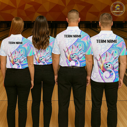 Four people standing in a bowling alley, viewed from behind, wearing matching white bowling shirts with a colorful holographic swirl design and cartoon bowling pins on the back. The shirts have customizable text placeholders.
