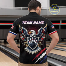 Load image into Gallery viewer, Person wearing a black bowling shirt with an eagle design and 'Team Name' text on the back, standing in a bowling alley.