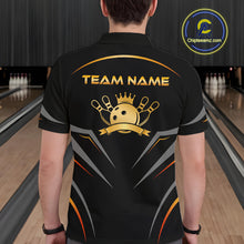 Load image into Gallery viewer, Person wearing a black bowling shirt with 'Team Name' and logo in a bowling alley.