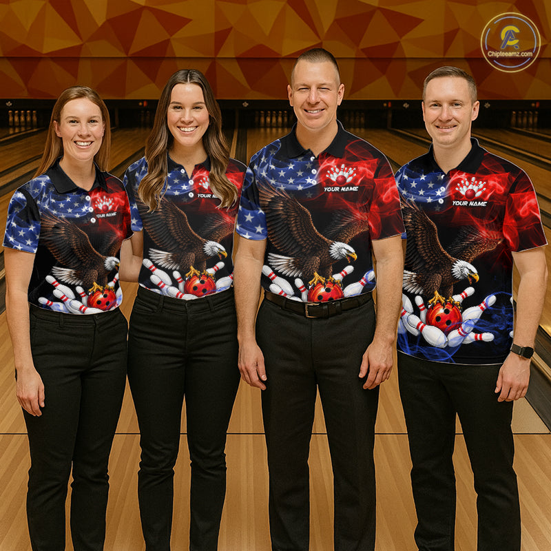 Four people standing in a bowling alley wearing matching patriotic bowling-themed bowling shirts with eagle and bowling pin graphics, paired with black pants.