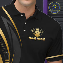 Load image into Gallery viewer, Black polo shirt with gold logo and text on a blurred background