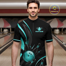 Load image into Gallery viewer, Man wearing a black and teal bowling shirt with a personalized name on a bowling alley background