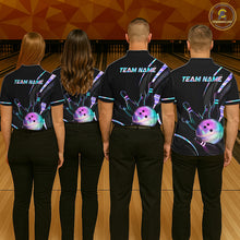Load image into Gallery viewer, Four people wearing black bowling shirts with colorful designs on a bowling alley.