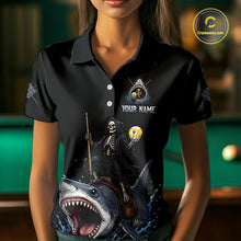 Load image into Gallery viewer, Black polo shirt with a skeleton and shark design, featuring 'Your Name' text, against a blurred pool table background.