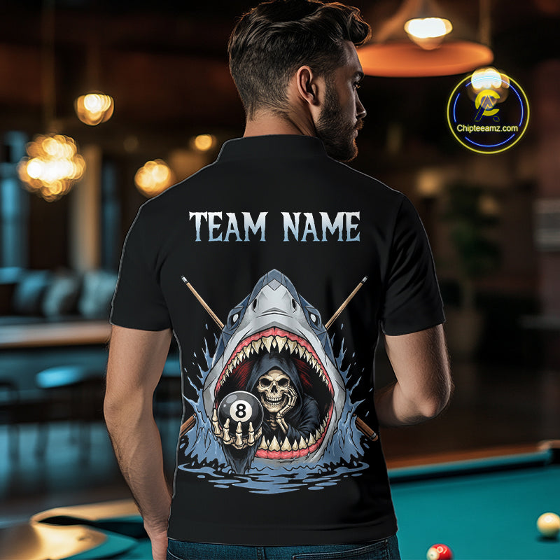 Person wearing a black t-shirt with a shark and skull design and 'TEAM NAME' text, in an indoor setting.