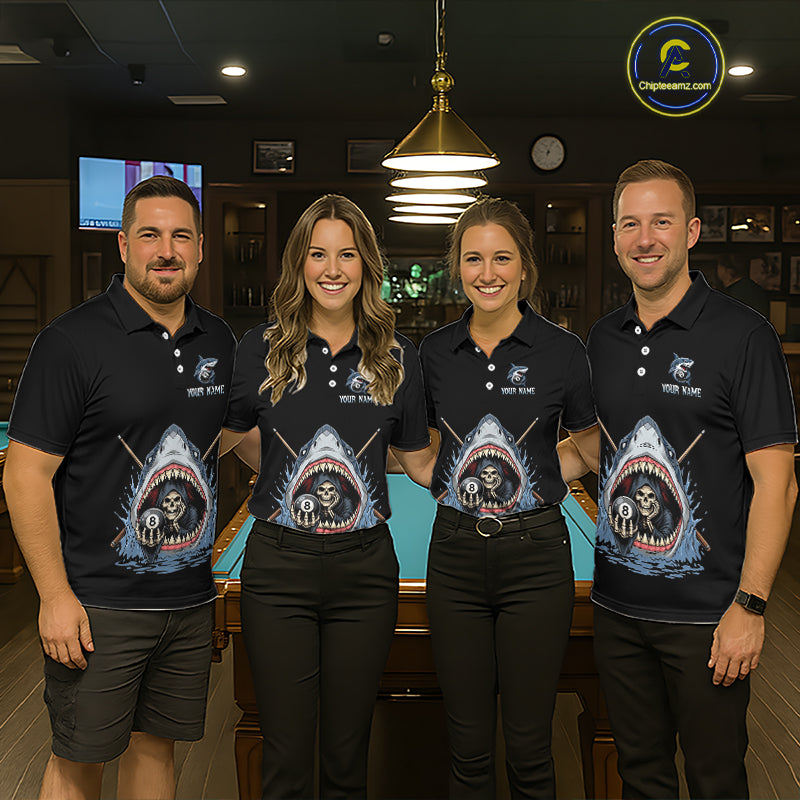 Four people wearing matching black polo shirts with a shark graphic design in a bar setting.