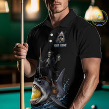 Load image into Gallery viewer, Man wearing a black polo shirt with a shark and skeleton design, holding a pool cue in a billiards setting.