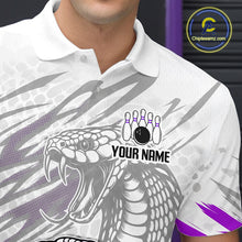 Load image into Gallery viewer, White polo shirt with snake design and bowling elements, featuring a brand logo in the corner.