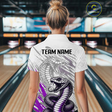 Load image into Gallery viewer, Person wearing a shirt with a snake design and 'TEAM NAME' text in a bowling alley.