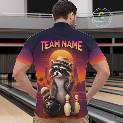 A man viewed from behind wearing a custom bowling-themed short-sleeve shirt with a colorful raccoon graphic and 'TEAM NAME' text, set against a bowling alley background.